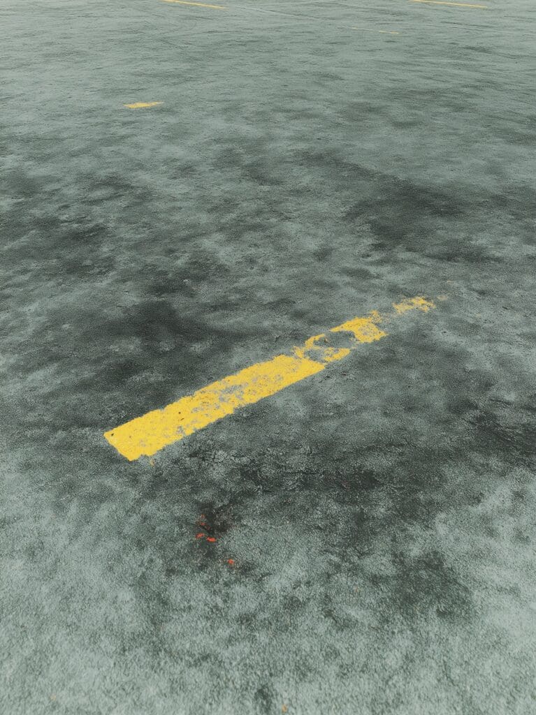 asphalt tack on concrete